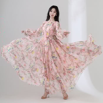 Tencel anyagú hosszú ruha virágos mintával, kerek nyakú, hosszú ujjú, lazán szabott derék