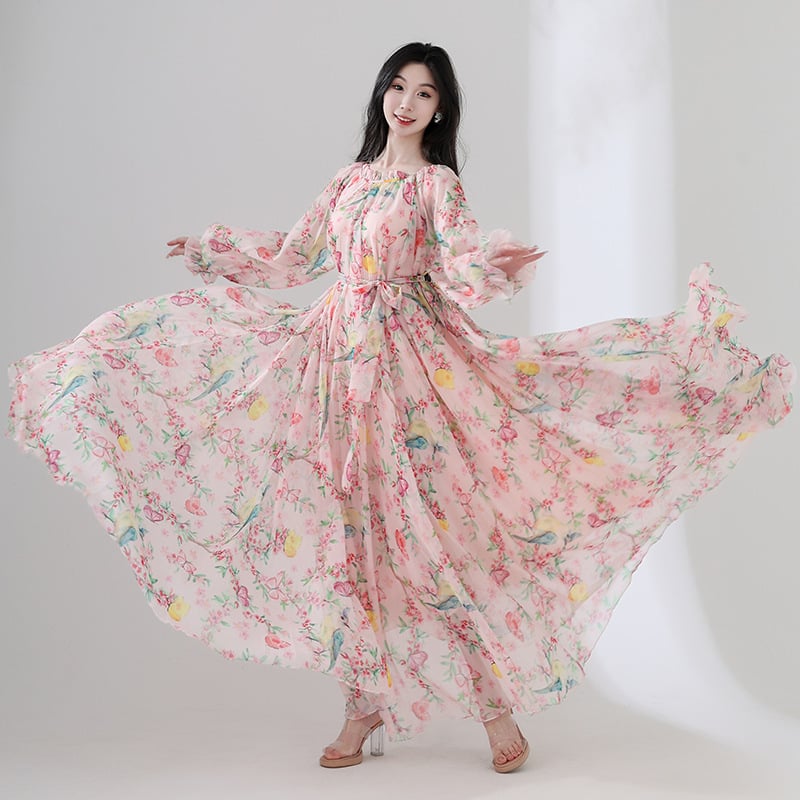 Tencel anyagú hosszú ruha virágos mintával, kerek nyakú, hosszú ujjú, lazán szabott derék