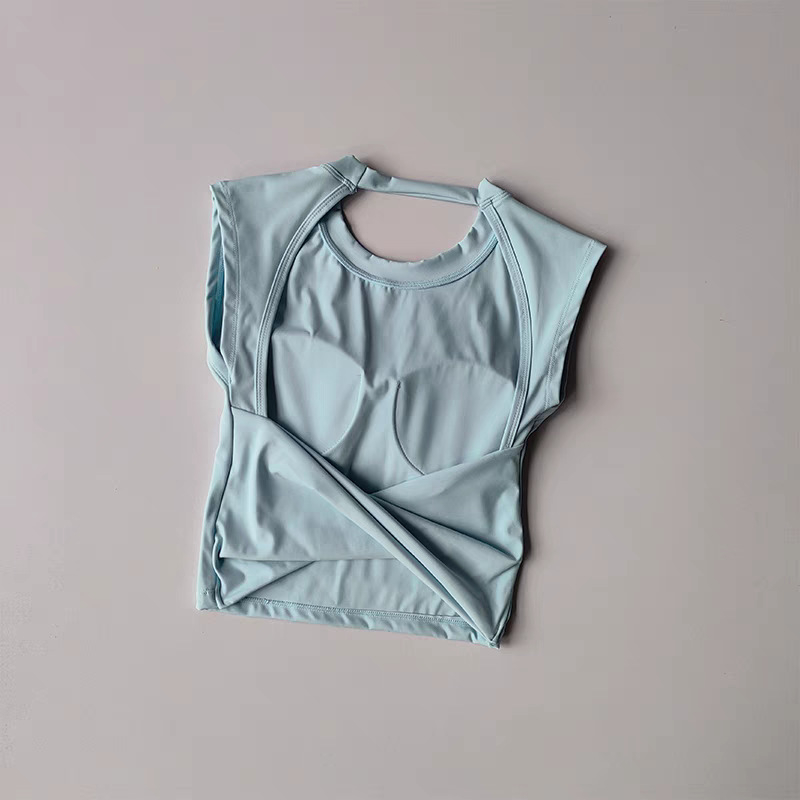 Sieviešu jogas tops bez piedurknēm ar atvērtu muguru un fiksētu krūšu atbalstu - ātri žūstošs materiāls, 75% neilons, 25% spandex; šaurs griezums; vidukļa garums