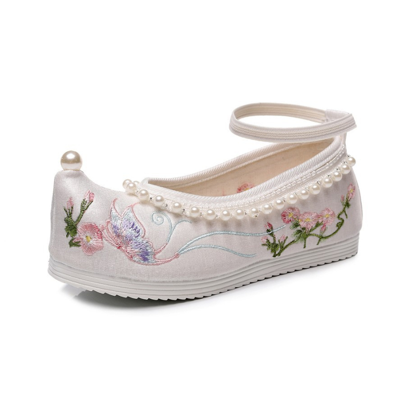 Gyerekeknek készült hímzett vászoncipő, alacsony felső, elasztikus szalaggal zárható, pamut bélés, textile belső talp