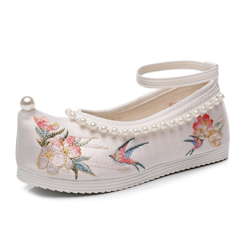 Gyerekeknek készült hímzett vászoncipő, alacsony felső, elasztikus szalaggal zárható, pamut bélés, textile belső talp