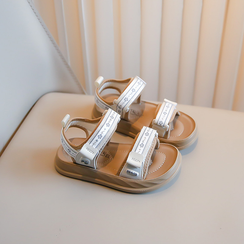 Dječje plažne sandale: protuklizna mekana potplat; zatvaranje na Velcro; gornji dio od sintetičke kože; potplat od poliuretana.