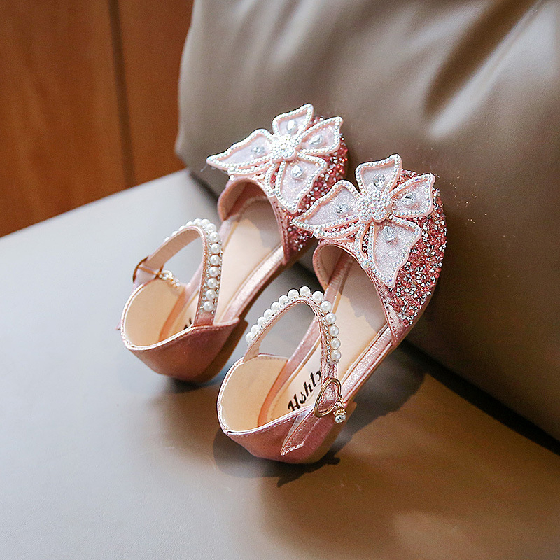 Meitenēm paredzētas sandales ar spīdumiem un lielu lenti, augšējā daļa no mākslīgās ādas, Velcro aizdare, PU zolīte