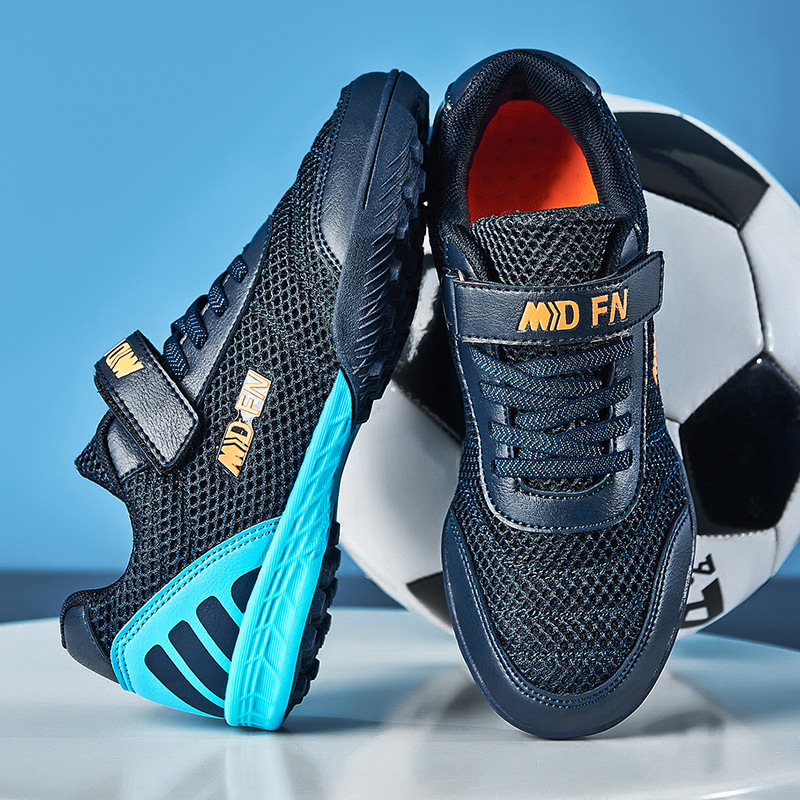 Παιδικά παπούτσια ποδοσφαίρου με Velcro κούμπωμα, διαπνέον εσωτερικό από πλέγμα, άνω μέρος από συνθετικό δέρμα, χαμηλό κόψιμο, αντιολισθητική σόλα από καουτσούκ