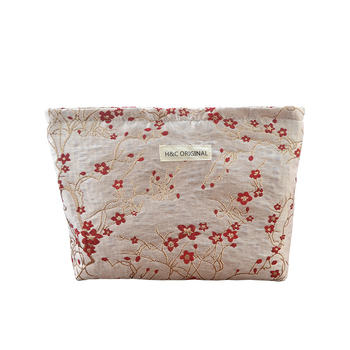 Ženska prijenosna kozmetička torbica s reljefnim cvjetnim uzorkom, poliester, podstava od platna, putni organizator
