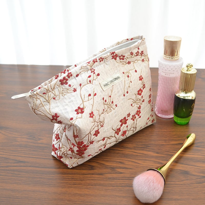 Ženska prijenosna kozmetička torbica s reljefnim cvjetnim uzorkom, poliester, podstava od platna, putni organizator