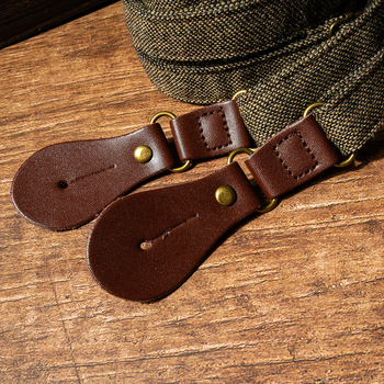 Unisex petnešos iš karuotos audinio su kryžminiu nugaros dizainu, 3 klipsai, reguliuojamas ilgis, suaugusiems