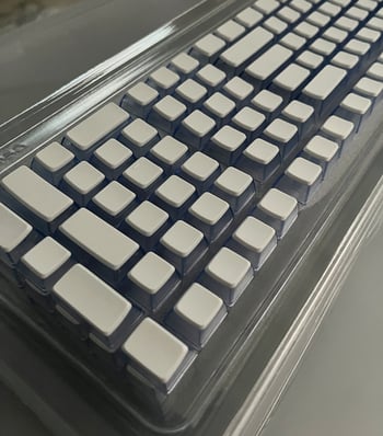 Material pentru capace de taste PBT, injecție bi-color, transparent pe toate cele patru laturi, potrivit pentru sublimare