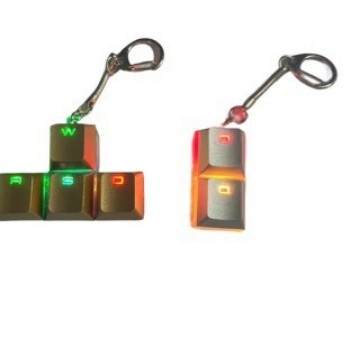 Metāla taustiņa bāze, gaismu izstarojošs caurspīdīgs taustiņš ar čūsku kaulu ķēdi