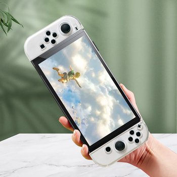 Nintendo Switch OLED aizsarglāde, TPU mīkstā korpuss, caurspīdīgi atdalāmi rokturi, PC+TPU materiāls, saderīgs ar Switch OLED, svars 93 g