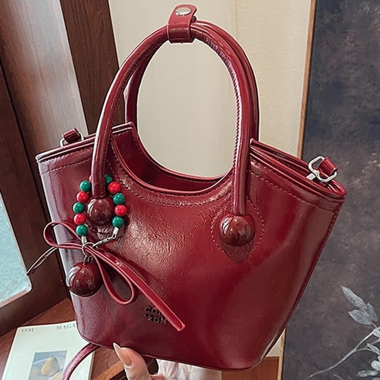 PU materjalist bucket kott, linnaliku lihtne stiil, tõmblukuga suletud, polüestervooder, sisemine zip-kott ja identifikatsiooni kott