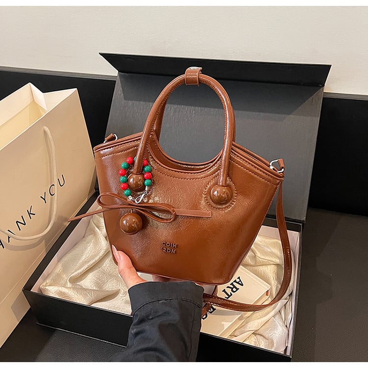 PU materjalist bucket kott, linnaliku lihtne stiil, tõmblukuga suletud, polüestervooder, sisemine zip-kott ja identifikatsiooni kott