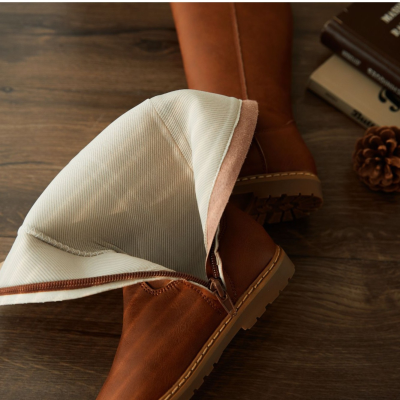 Laste Martens-stiilis saapad, nahk pealispind, kõrge varrukas, kummijalad, külgrihmluk, sisetald lühikese pliisi ja tugeva puuvillaga