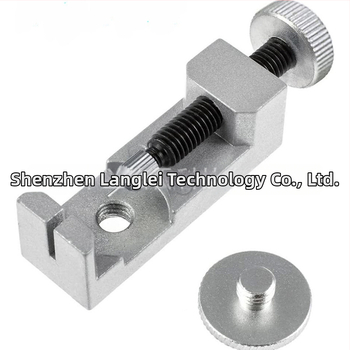 Kovový nástroj na opravu hodiniek s nastaviteľnou výškou pre vyberanie remienka