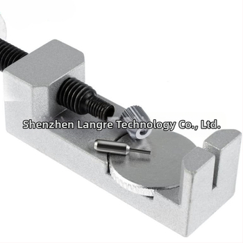 Kovový nástroj na opravu hodiniek s nastaviteľnou výškou pre vyberanie remienka