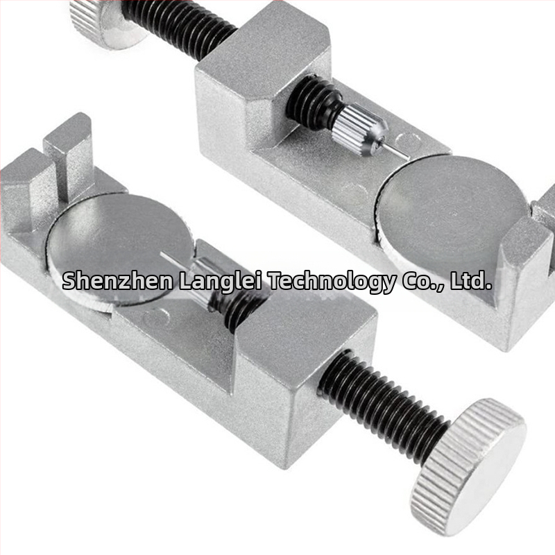 Kovový nástroj na opravu hodiniek s nastaviteľnou výškou pre vyberanie remienka