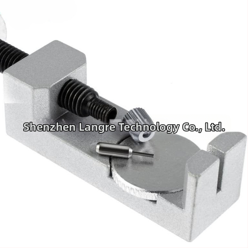 Kovový nástroj na opravu hodiniek s nastaviteľnou výškou pre vyberanie remienka