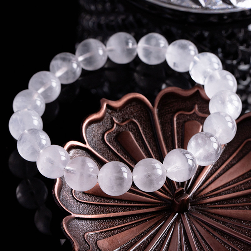 Kristalna narukvica s kristalom duha; unisex, prirodni stil; materijal: kristal duha; prerada: brušenje i poliranje; oblik: rasute perle