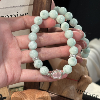 Rózsakvarc kristály karkötő, oldalkövek nélkül, Shantou eredet, divatos stílus (Kristály: rózsakvarc; Oldalkövek: nincs; Eredet: Shantou; Stílus: divat; Megjelenés: őszi 2025)