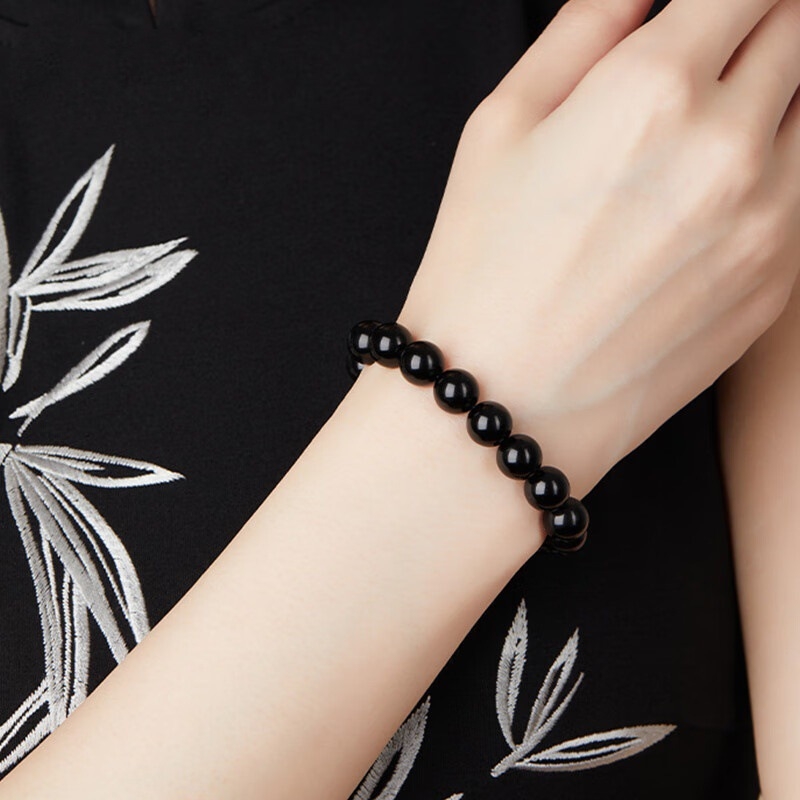 Narukvica od obsidijana, unisex stil, prirodni stil, geometrijski oblik (Materijal: obsidijan; Obrada: brušenje i poliranje; Stil: unisex; Oblik: geometrijski; Kategorija: ručni ukras)