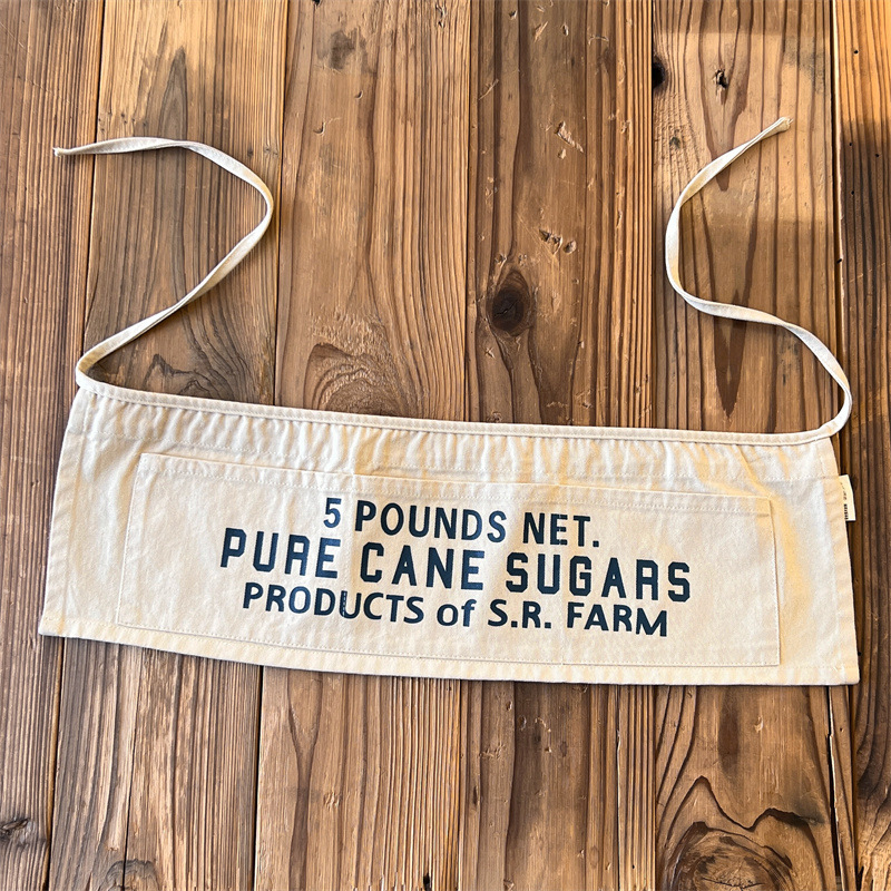 Bērnu priekšauts, japāņu stila, daudzfunkcionāls, mīksti apstrādāts audums, ar burtiem rakstu