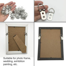 270 vnt. geležinių dantinių pakabų komplektas fotografijų rėmams pakabinti