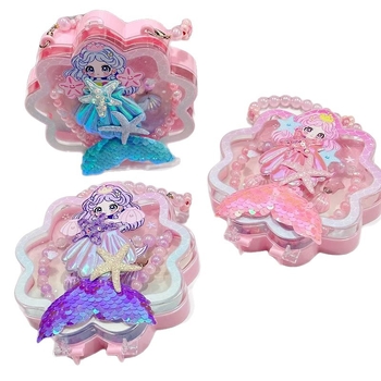 Meitenēm paredzēts jūras sirēnas astes un jūras gliemežu motīvs – kaklarota, gredzens un matu klipsi – materiāls PC – vecums 3–10 gadi – rudens 2025 izdevums