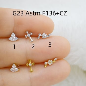 Lūpų piercing papuošalas – titano lydinys, G23 ASTM F136, geometrinis dizainas su gėlės kryžiumi ir marquise cirkoniu, graviruotas