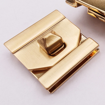 Bagāžas mehānisms no cinka sakausējuma ar grozāmo slēdzeni sieviešu somām