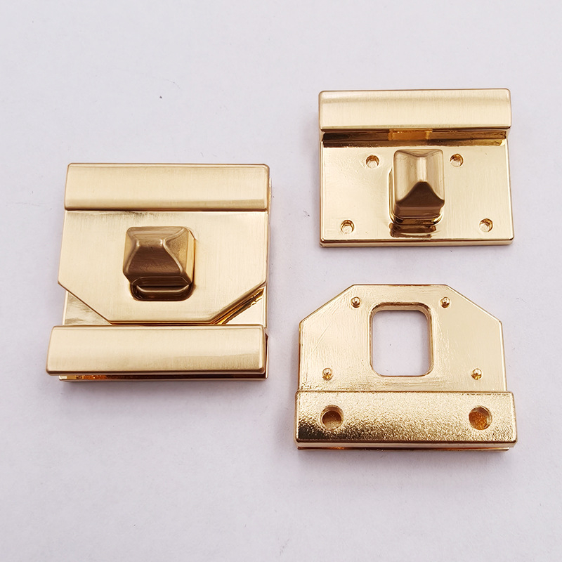 Bagāžas mehānisms no cinka sakausējuma ar grozāmo slēdzeni sieviešu somām