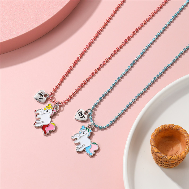 Παιδικό κολιέ με μενταγιόν μονόκερος, καρτούν στυλ; επίχρισμα με στάξεις λαδιού; υλικό: κράμα; αλυσίδα σφαιρική