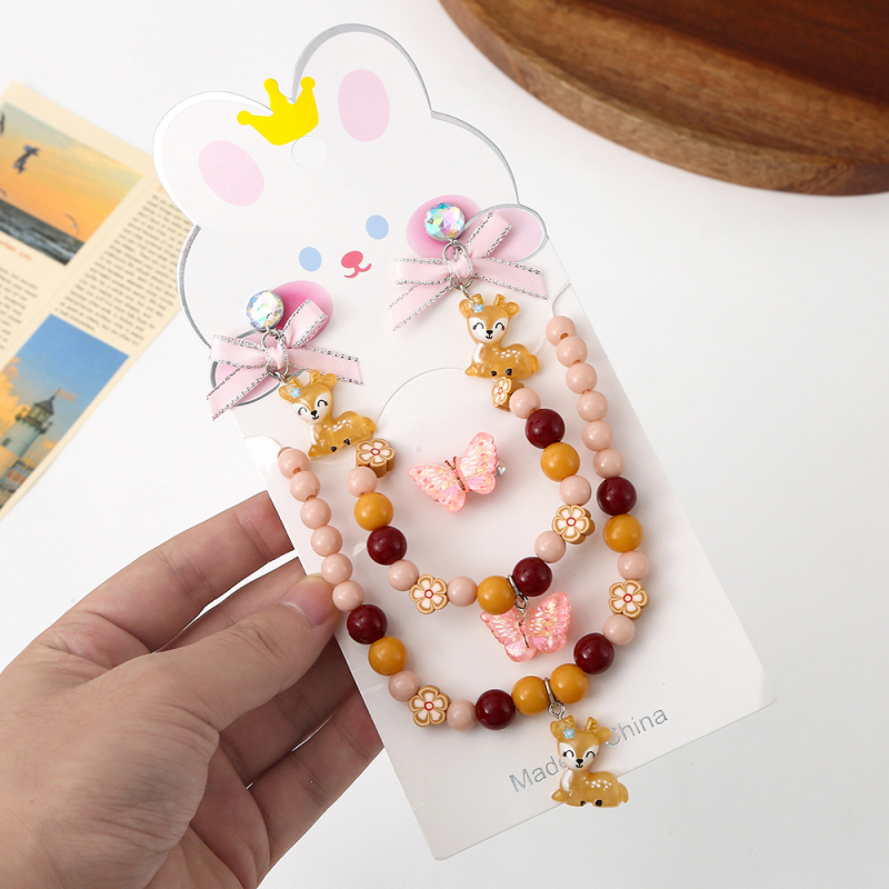 Dječji set naušnica na klipse za djecu, dugom mašnom princeze, šumski stil, asimetričan dizajn — ručno izrađeno, plastika/resin, imitacije perli, motivi crtani likovi