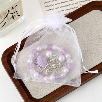 Set detského náhrdelníka a náramku — tenký reťaz, príves z imitácie perly, plast/rezín s elektrolytickým pokovením, motív animovaného hrdinu