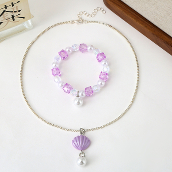 Set detského náhrdelníka a náramku — tenký reťaz, príves z imitácie perly, plast/rezín s elektrolytickým pokovením, motív animovaného hrdinu