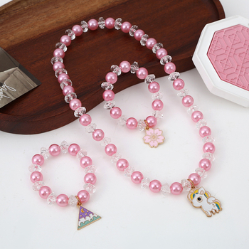 Gyermekeknek szóló unikornis ékszerszett — kézzel készített műanyag/gyanta nyaklánc és karkötő, imitált gyöngyökből készült virág medállal, hercegnő/rajzfilm stílusban