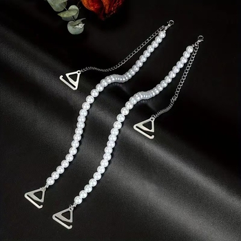 Reguliuojama pečių juosta su imitacinėmis perlomis ir nuimama grandine išoriniams drabužiams (ST250207)