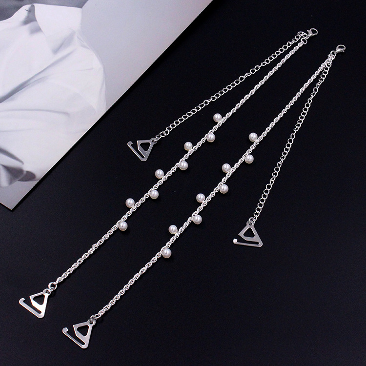 Nematomi pečių dirželiai liemenėlėms su metalinėmis perlomis – Medžiaga: metalas; Išleidimo į rinką laikas: 2023 m. pavasaris; Funkcija: Dekoracija