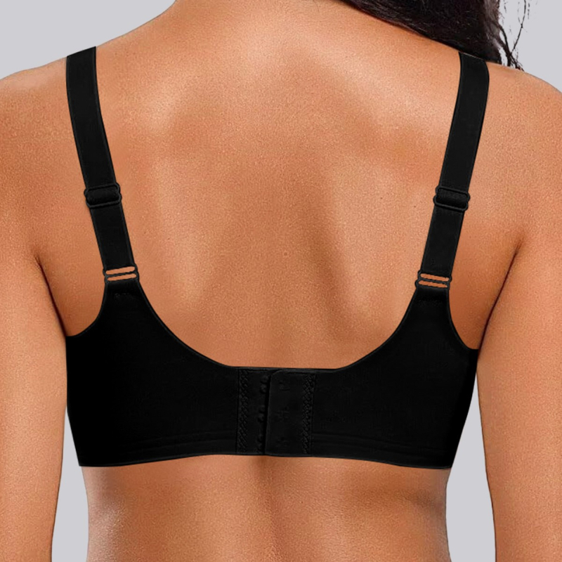 Дамски сутиен от найлон с мека опора, безшевен модел, чашка 3/4 с тънък горен ръб и по-дебел долен ръб, фиксирани двойни презрамки, задно закопчаване с четири реда куки