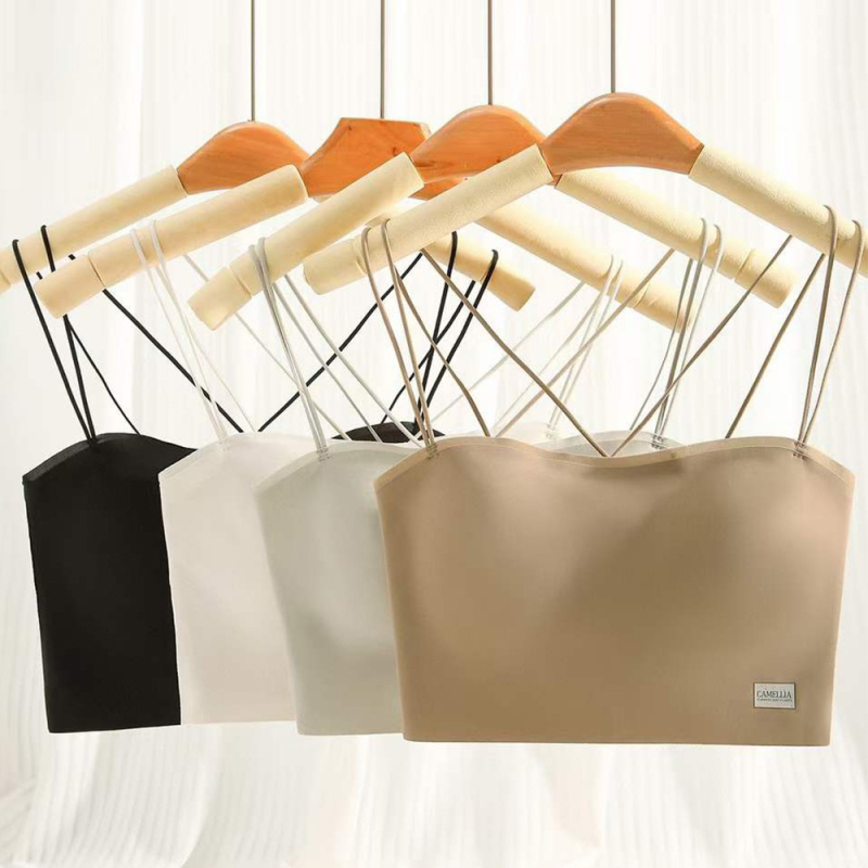 Bez plecu siksnām necaurspīdīgs ar krustu muguru, 3/4 krūšu kausi, plāni veidoti kausi, neilona audums