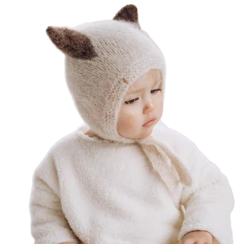 Pletena dječja kapa od kašmira s kupolastim krojem i rubom tipa eaves, zimska toplina; za dob djece od 0-6 mj., 6-12 mj., 1-2 god., 2-4 god., 4-6 god.; materijal: kašmir; tkanina: dlaka rakuna