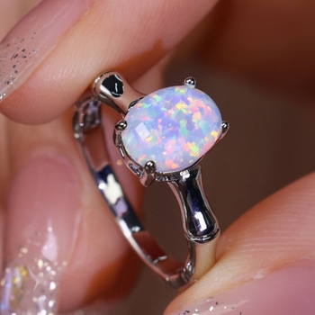 Пръстен с топаз, яйцевидна форма, дизайн с бамбукови сегменти, четиризъбна поставка, медна вложка, тегло 2.1 g, лято 2023