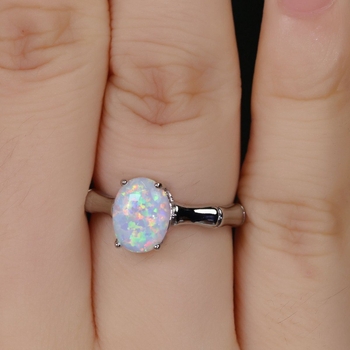 Пръстен с топаз, яйцевидна форма, дизайн с бамбукови сегменти, четиризъбна поставка, медна вложка, тегло 2.1 g, лято 2023