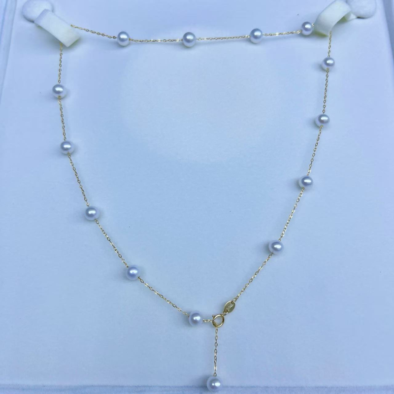 Ogrlica Saint Grace Jewelry s prirodnim slatkovodnim biserima, 5–6 mm savršeni okrugli biseri, 18k zlato