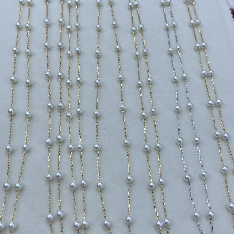 Ogrlica od prirodnih slatkovodnih bisera inspirirana Gypsophilom, s privjeskom u obliku kuglice, duljina do ključne kosti, butik stil