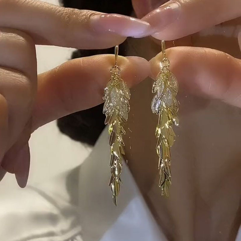 Χαλκόεινα σκουλαρίκια με ζιρκόν, μοτίβο φύλλων και στάχυ, μακριά κρόσσια.