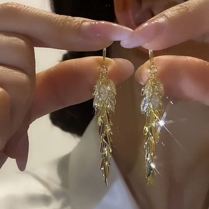 Χαλκόεινα σκουλαρίκια με ζιρκόν, μοτίβο φύλλων και στάχυ, μακριά κρόσσια.