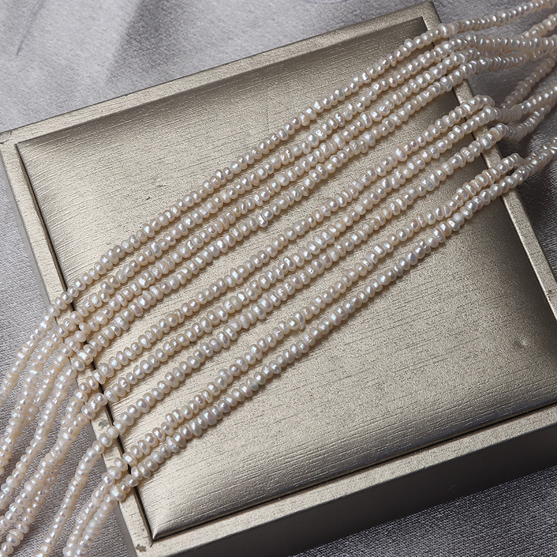 Édesvízi lapos gyöngyök – nyers gyöngyök, DIY félkész termék, kb. 37-38 cm hosszú szál, márka Zhenzhen