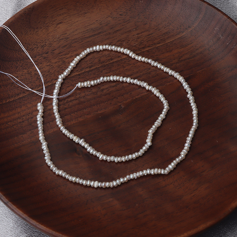 Édesvízi lapos gyöngyök – nyers gyöngyök, DIY félkész termék, kb. 37-38 cm hosszú szál, márka Zhenzhen