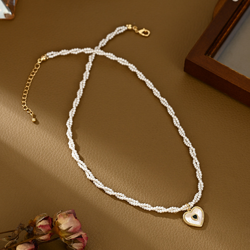 Youhan bakreni ogrlica, geometrijski oblik, lančić u obliku vodnog vala, proljeće 2025