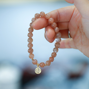 Narukvica sa sunčevim kamenom, bakreno pozlaćena, ručno pletena, model YGSL11-01